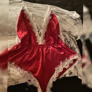 Never worn! Cute teddy with white lace detail